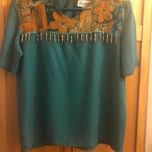Woman's Teal colored pants set